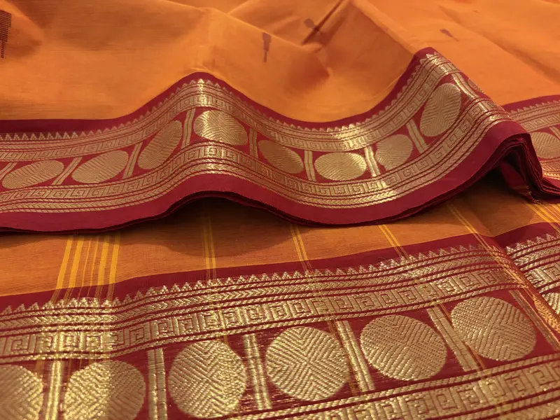 kanchi Cotton orange saree with maroon border and maroon butta