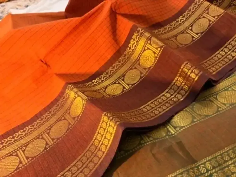 korvai cotton orange saree with green and brown border