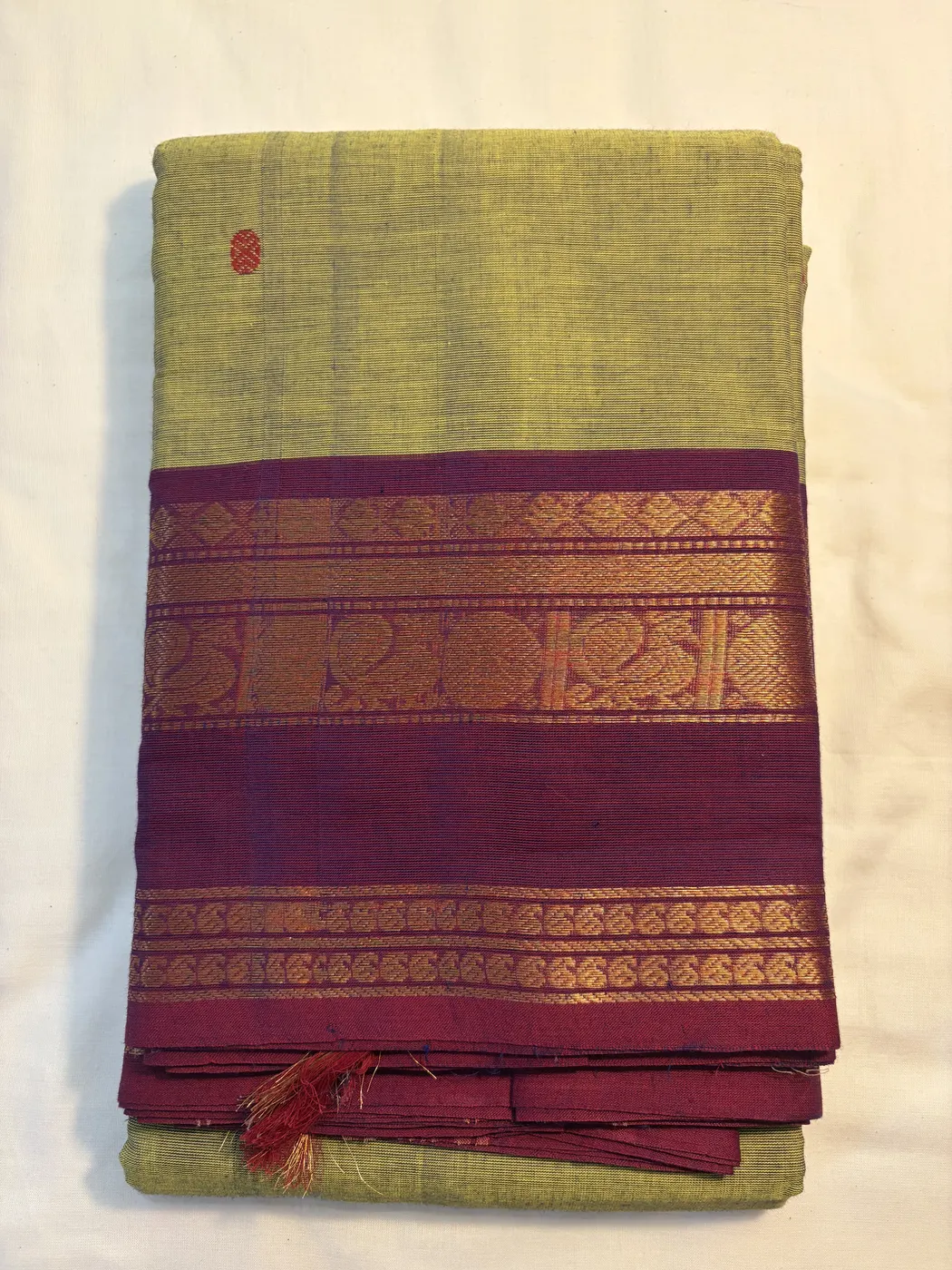 kanchi cotton green saree with purple border and purple butta — 2
