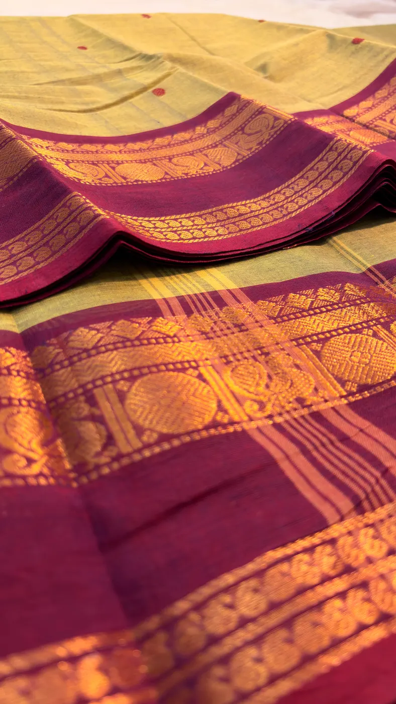 kanchi cotton green saree with purple border and purple butta — 3