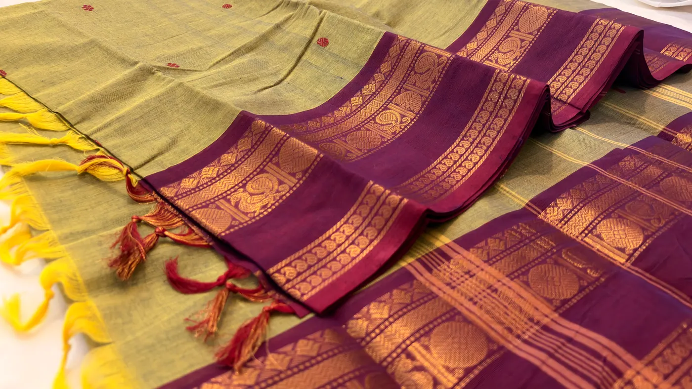 kanchi cotton green saree with purple border and purple butta — 1