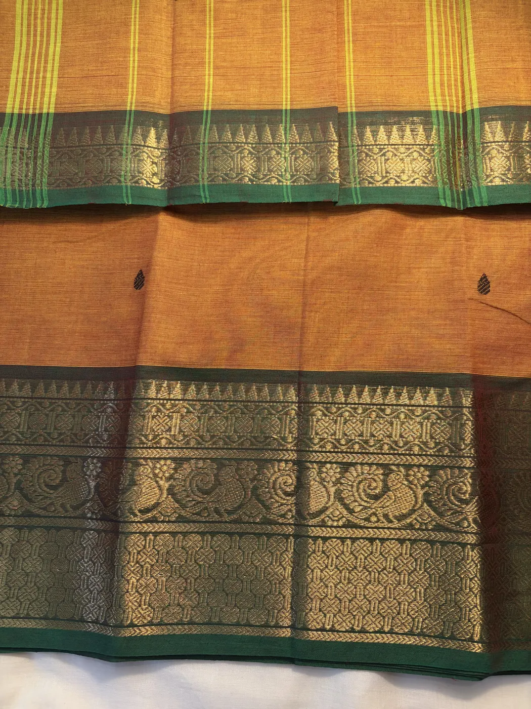 kanchi cotton yellow saree with green border and black butta — 1