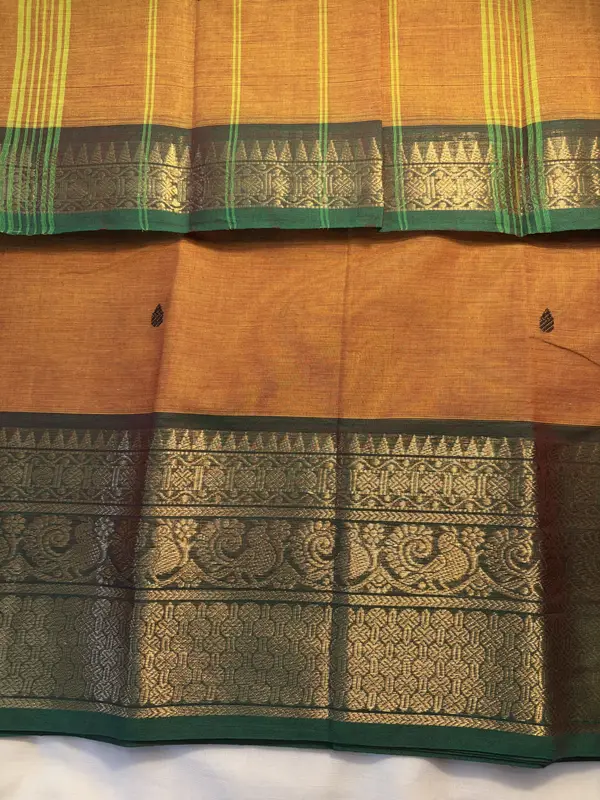 kanchi cotton yellow saree with green border and black butta